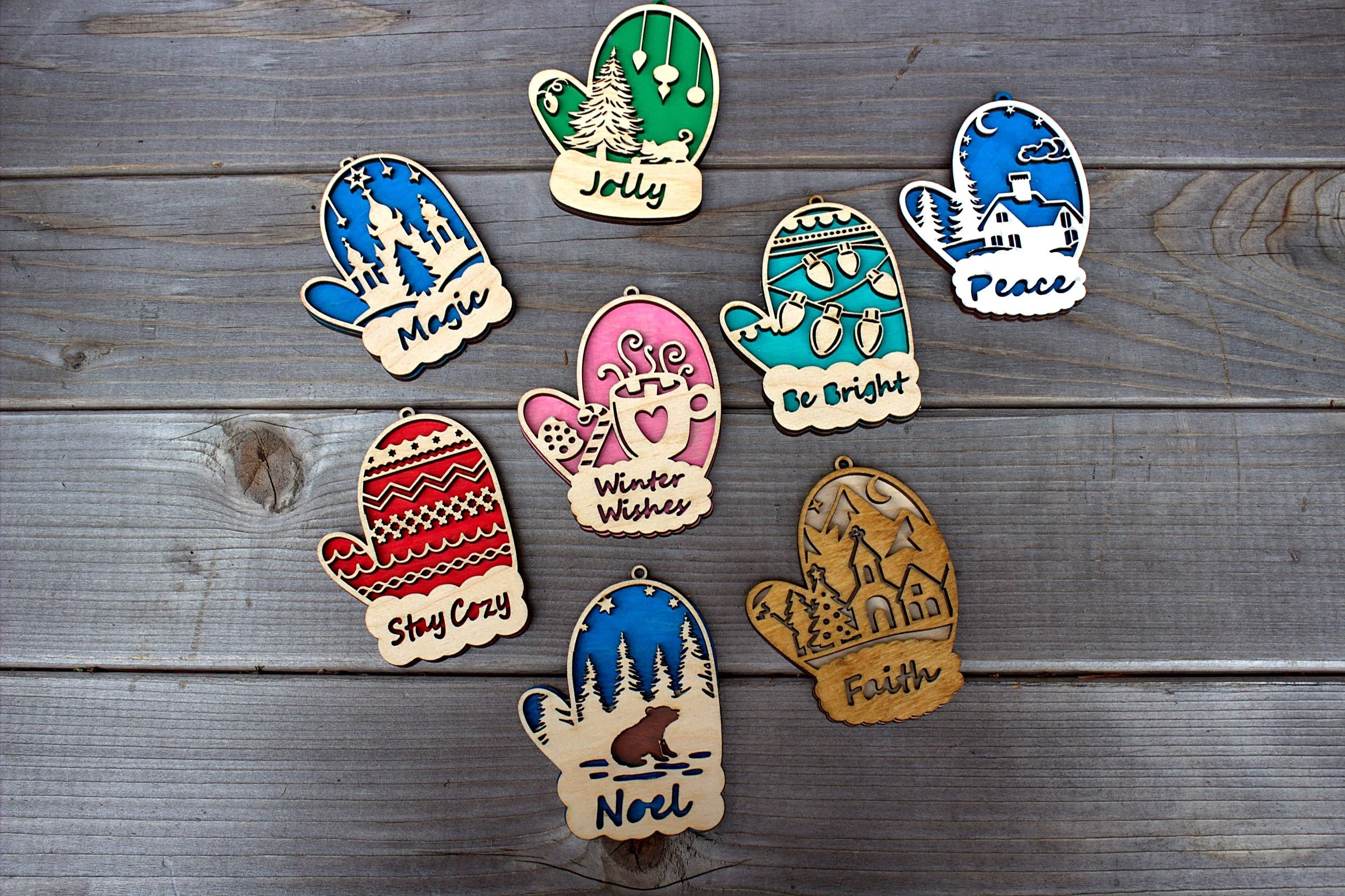 Laser-cut mitten ornaments — assorted holiday designs