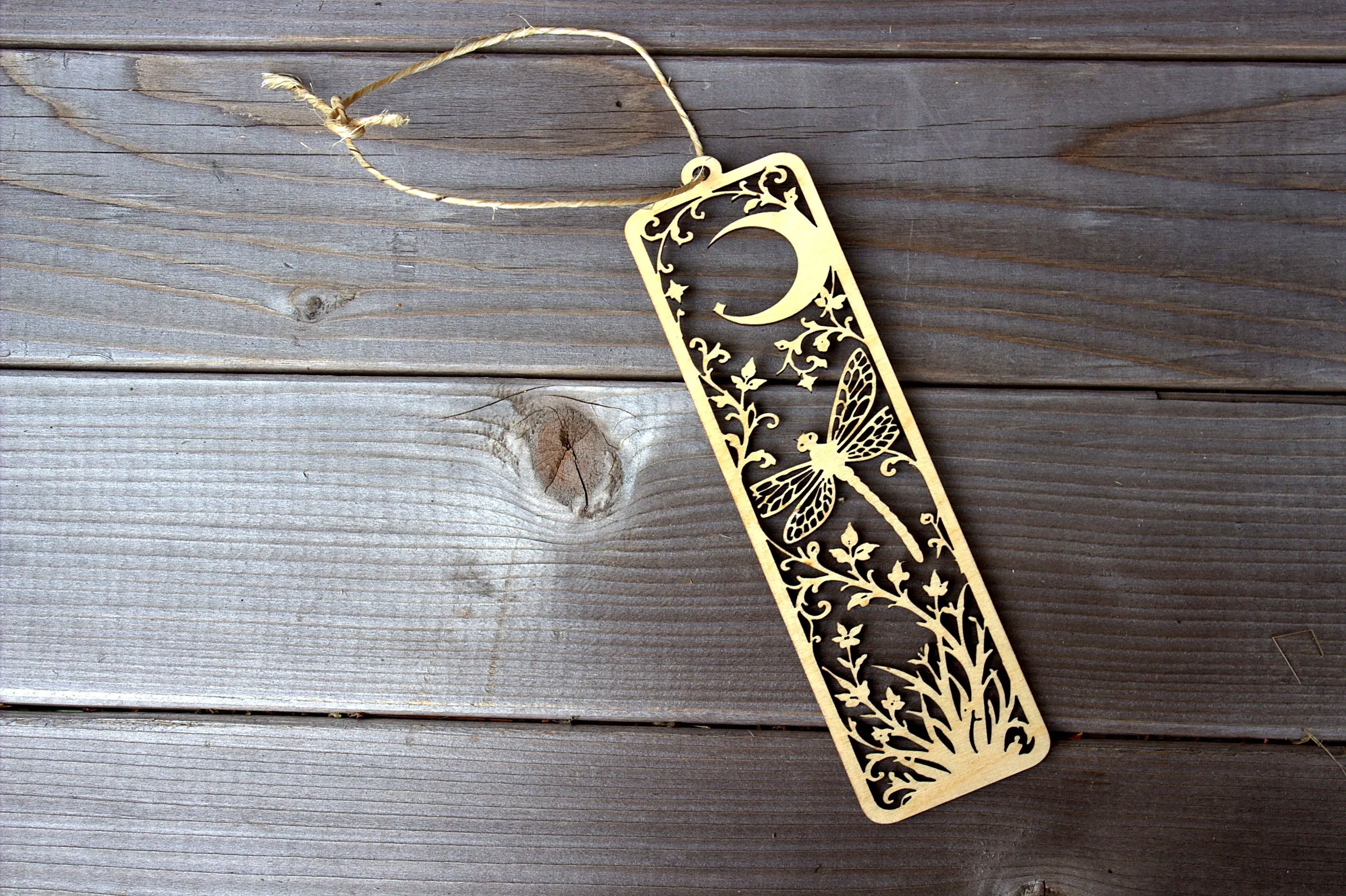 Laser-cut bookmark — dragonfly and crescent moon design