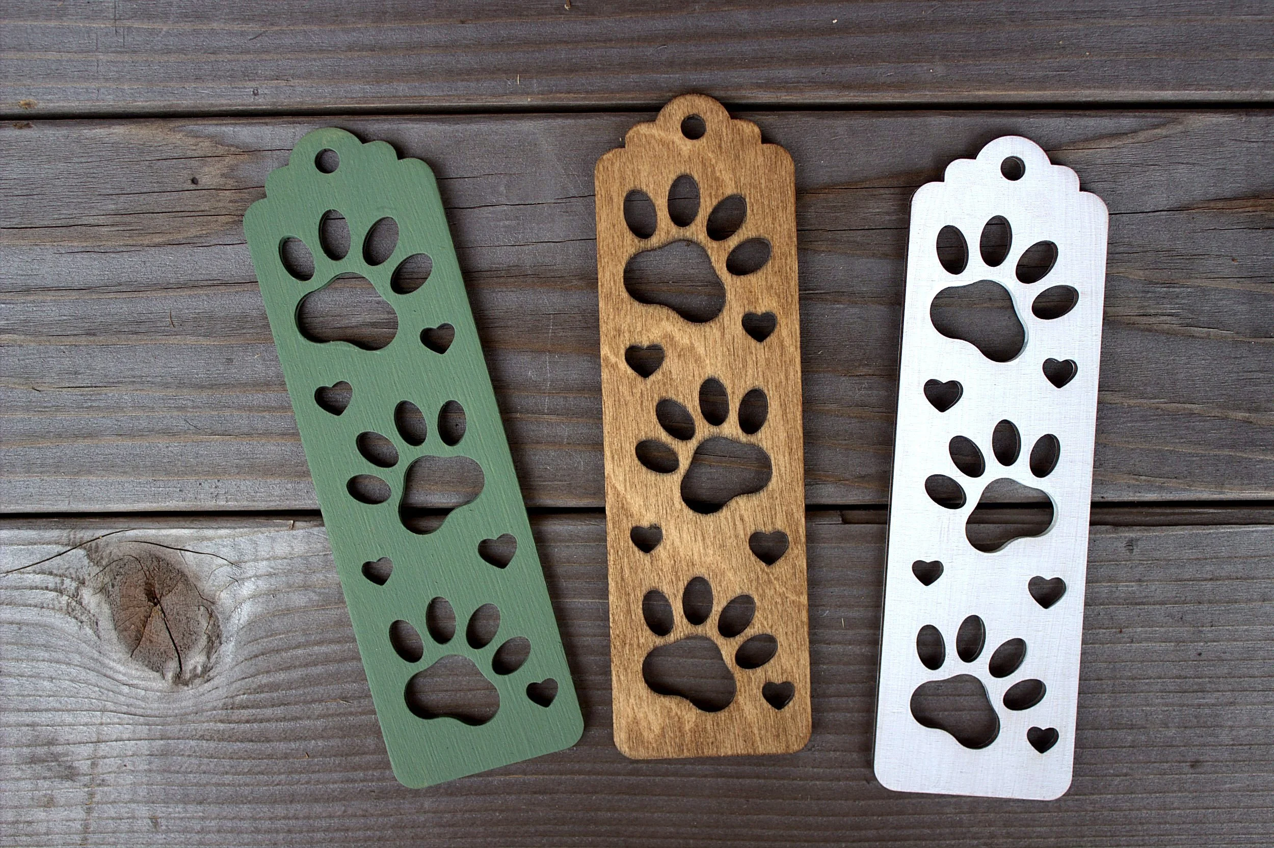 Laser-cut bookmarks — paw print design