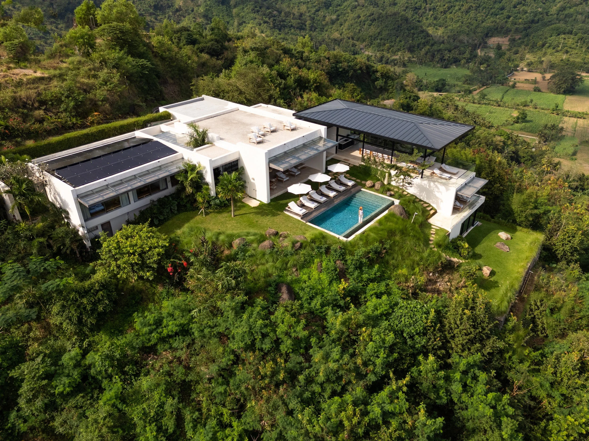Aerial view of Villa Kai Lani and its private pool on a hilltop in South Lombok