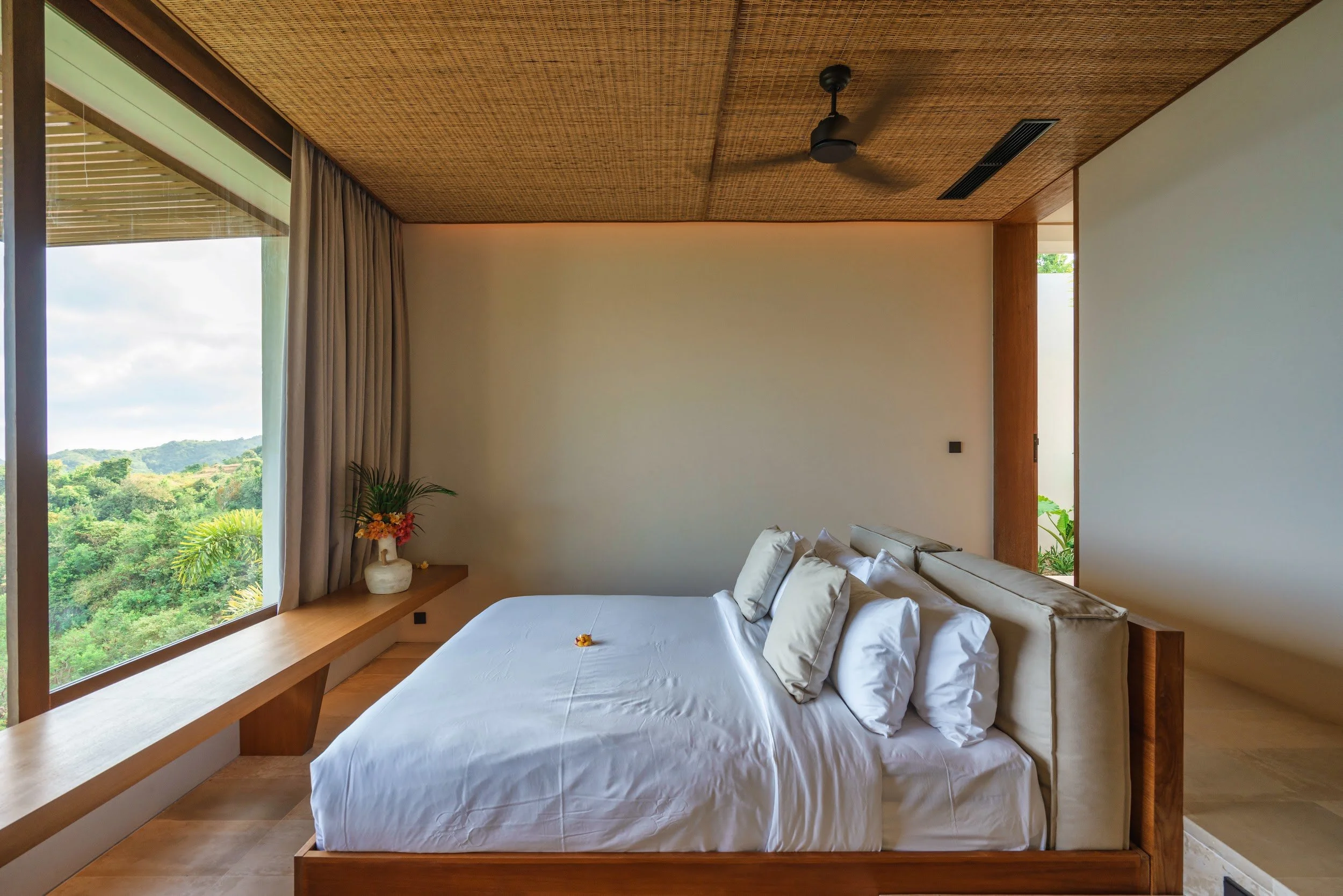 Bedroom 2 at Villa Kai Lani with a king bed and garden view