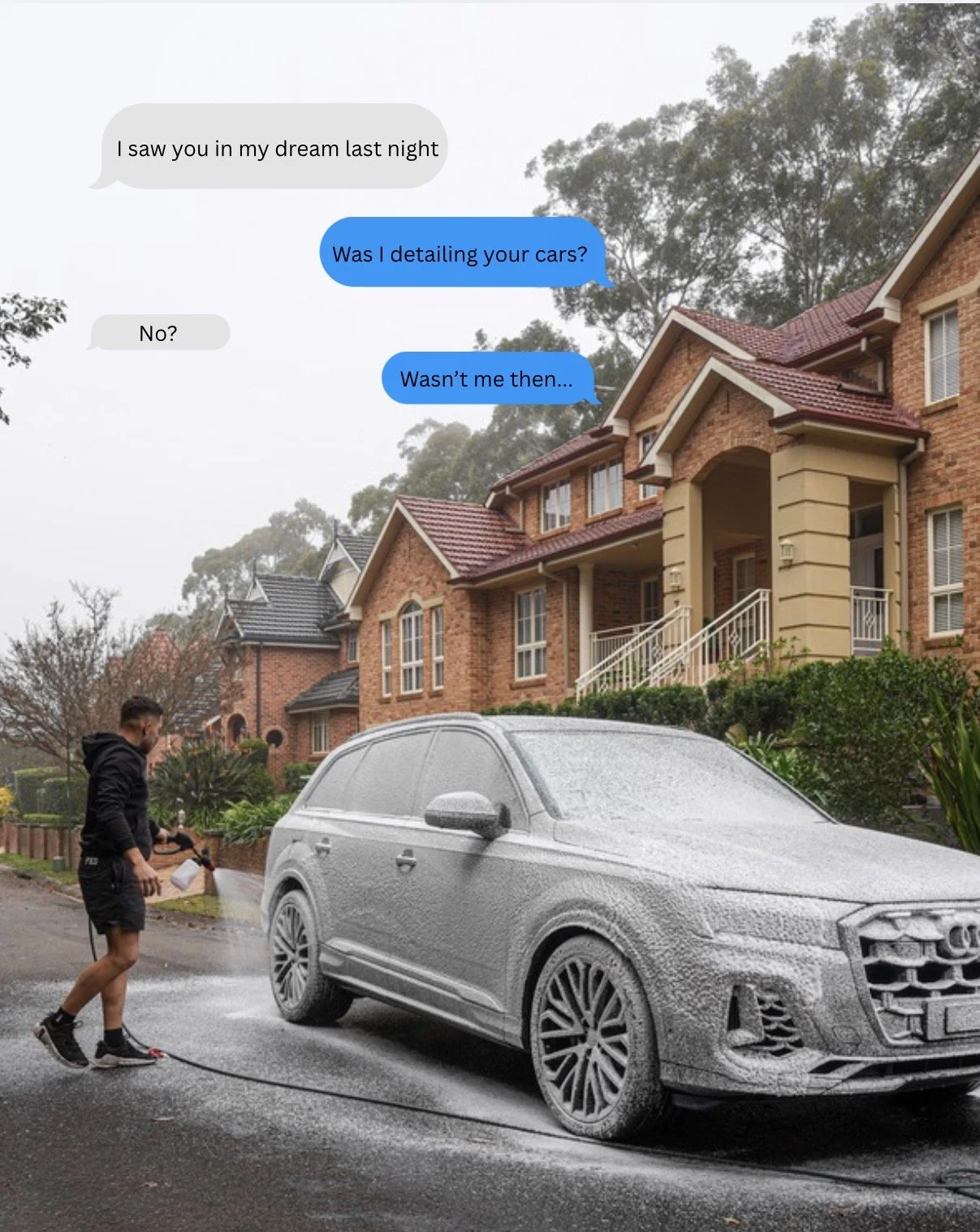 Car detailer pressure-washing a foam-covered Audi SUV outside suburban brick homes, with humorous text-message bubbles overhead