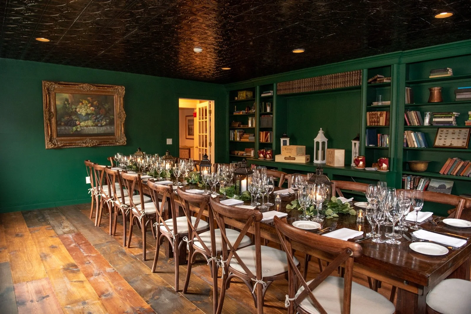 Gather around the table in the Emerald Room.
