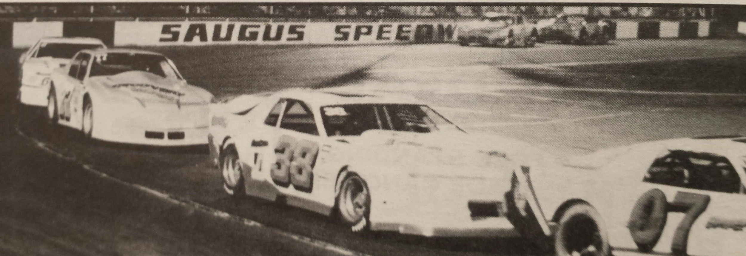 1990 Saugus Speedway NASCAR Super Late model division Driver Rick Crow follows NASCAR Winston West Series Champion Lance Hooper into turn four.