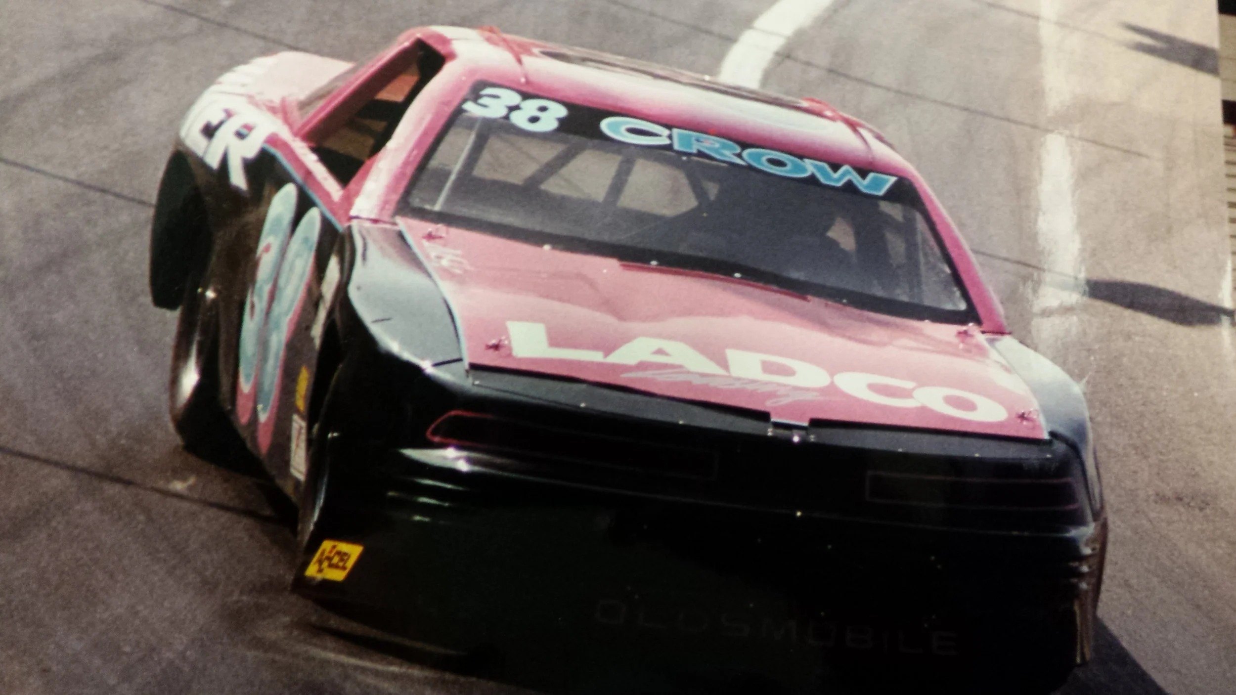 Driver Rick Crow in his NASCAR Late Model sponsored by Hamer Toyota, Memory Lane, and LADCO Leasing Orange Show Speedway 1996