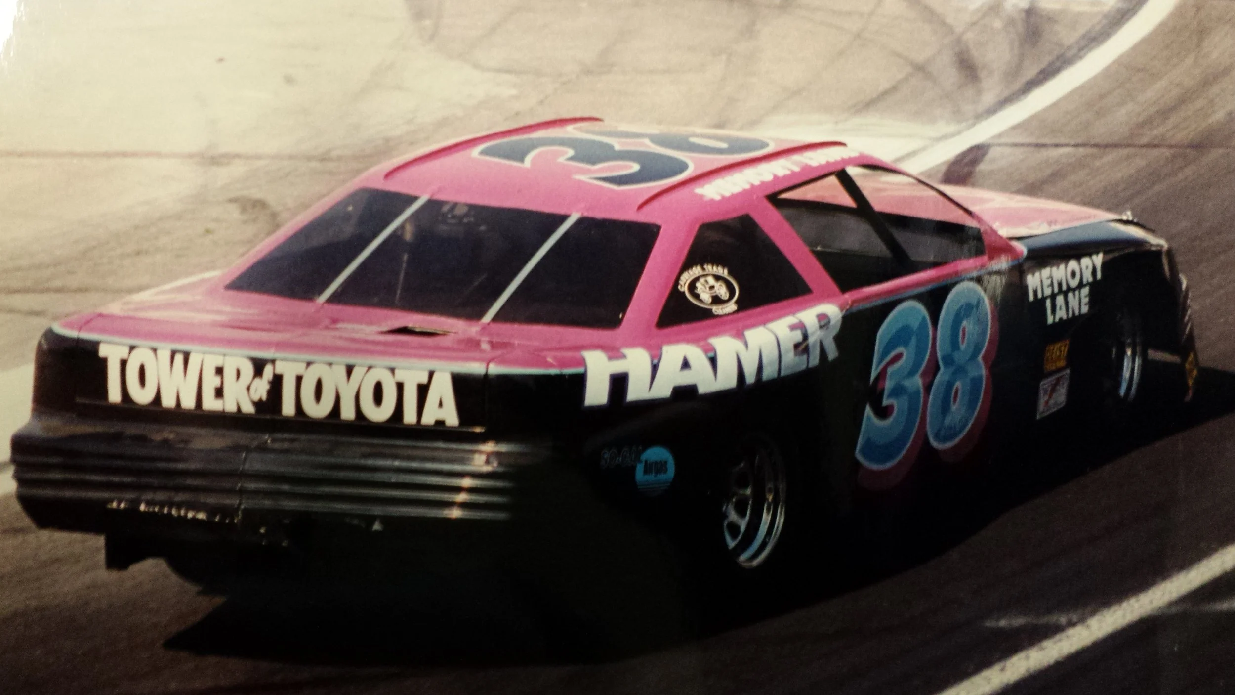 Driver Rick Crow in his NASCAR Late Model sponsored by Hamer Toyota, Memory Lane, and LADCO Leasing Orange Show Speedway 1996. Crow would go on to win the prestigious West Coast 100 lap Late Model Shootout.