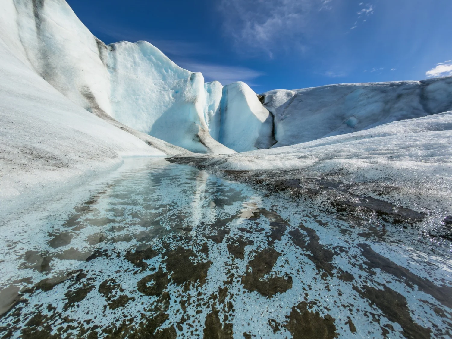 Blue glacier ice and meltwater