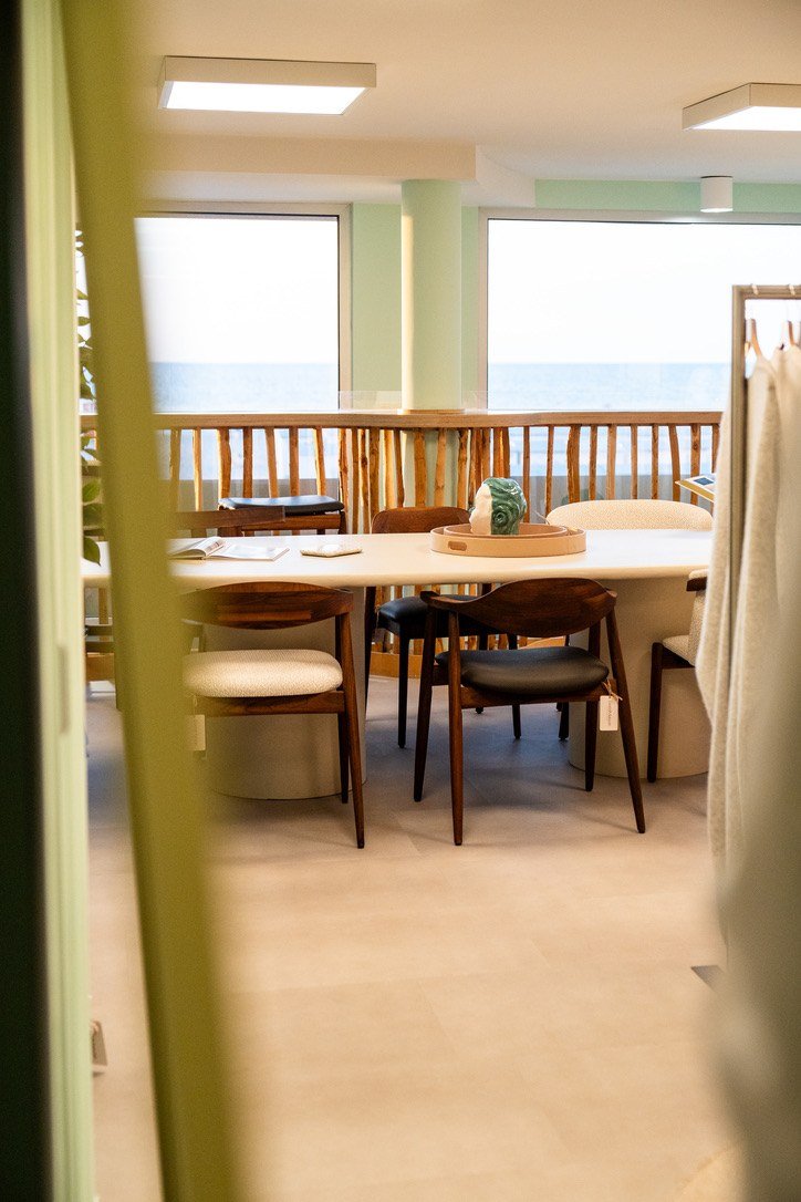 The showroom dining table with sea views