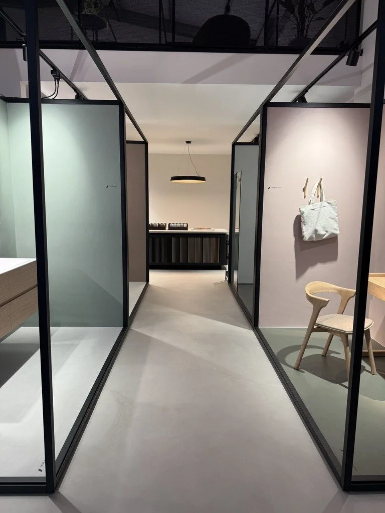 The showroom corridor of colour rooms in green and blush