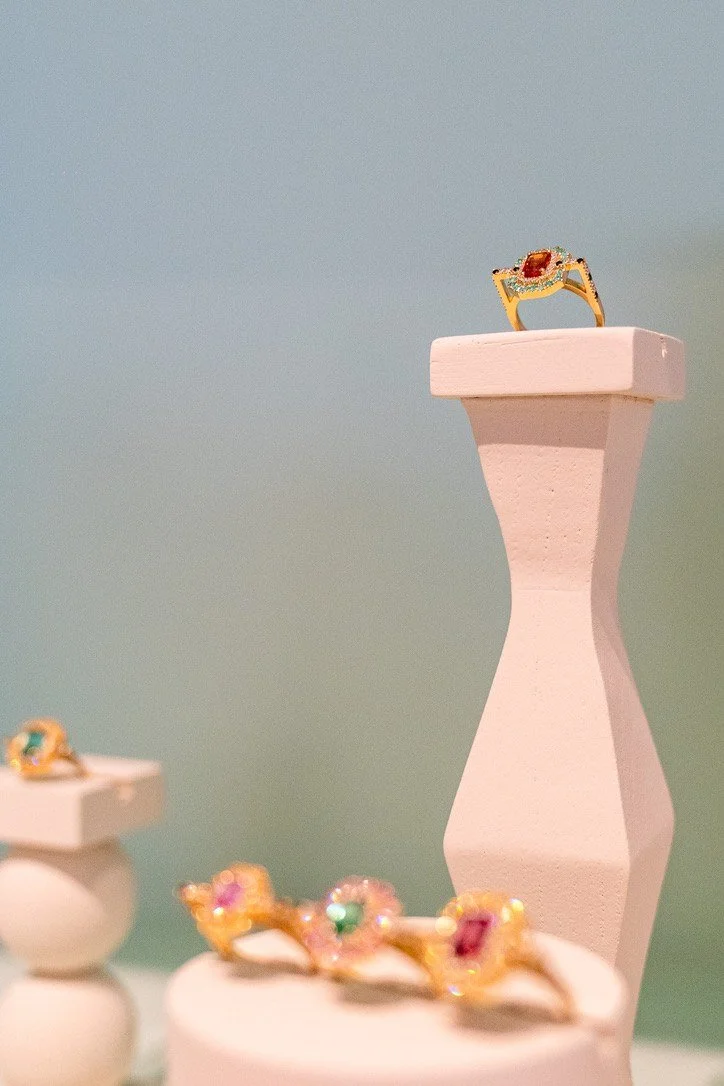 Elliot & Ostrich rings on sculptural plaster pedestals
