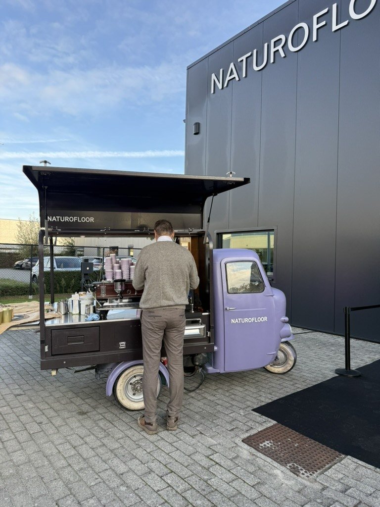 A lilac Naturofloor espresso tuk-tuk serving coffee