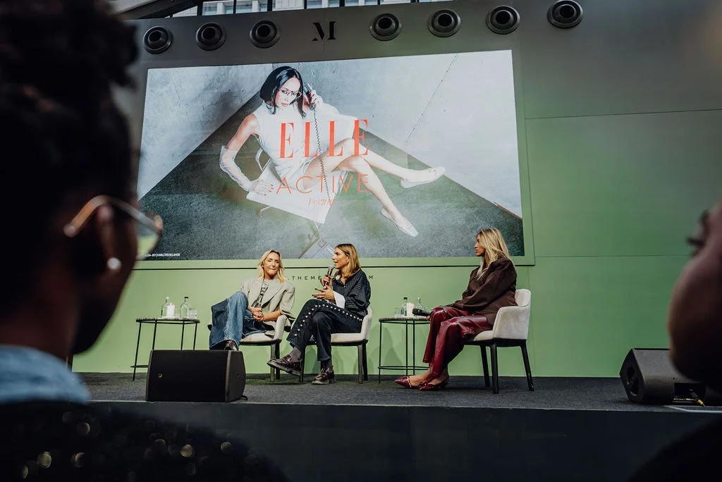 A panel of four women on stage under the ELLE Active Forum visual