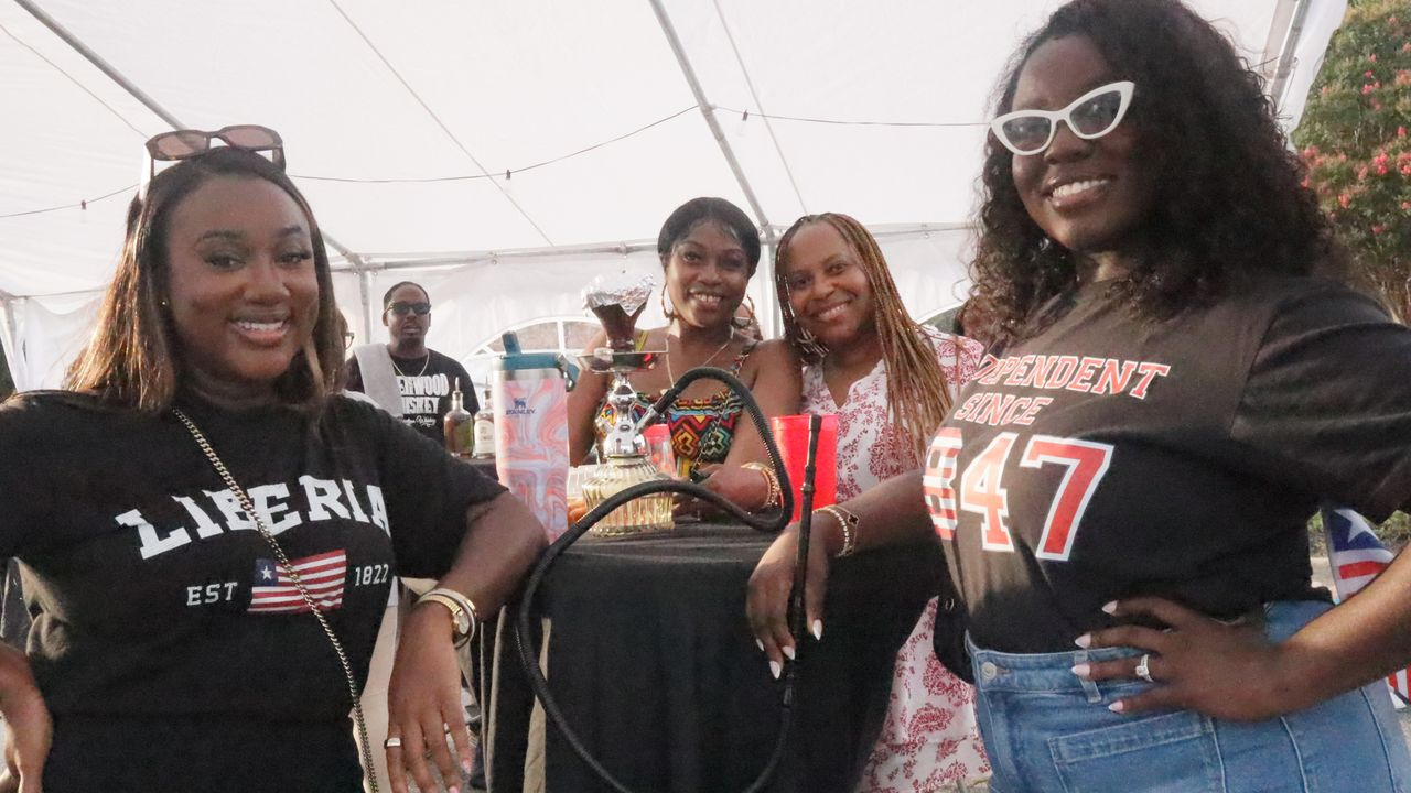 Guests celebrating Liberian culture at 1847Fest