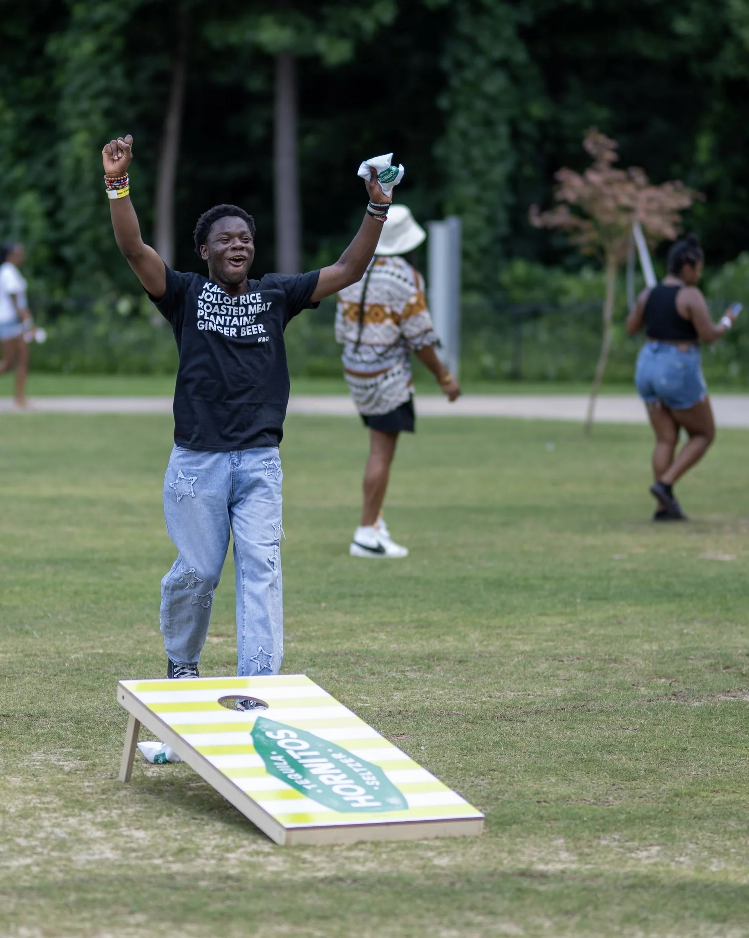 Community member celebrating at a Liberian Collective event