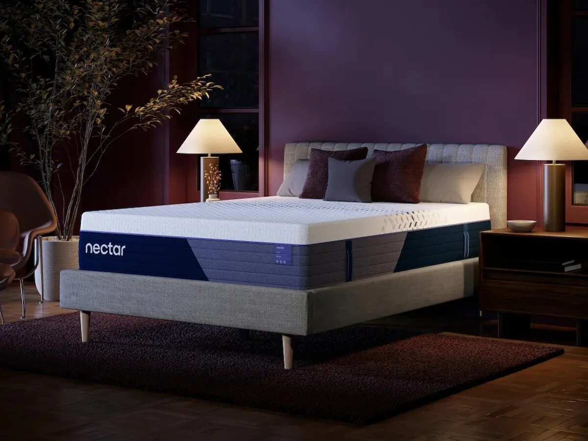 Nectar Luxe Hybrid mattress on an upholstered bed