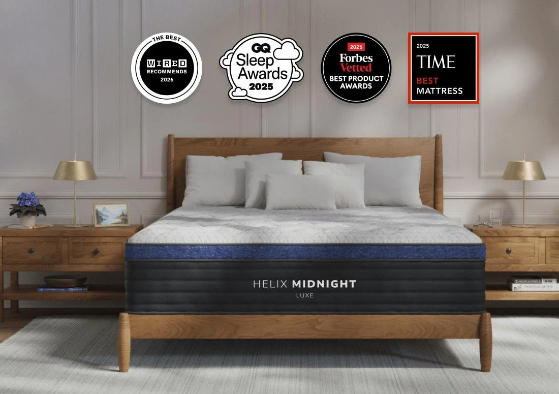 Helix Midnight Luxe mattress on a wooden bed in a bedroom