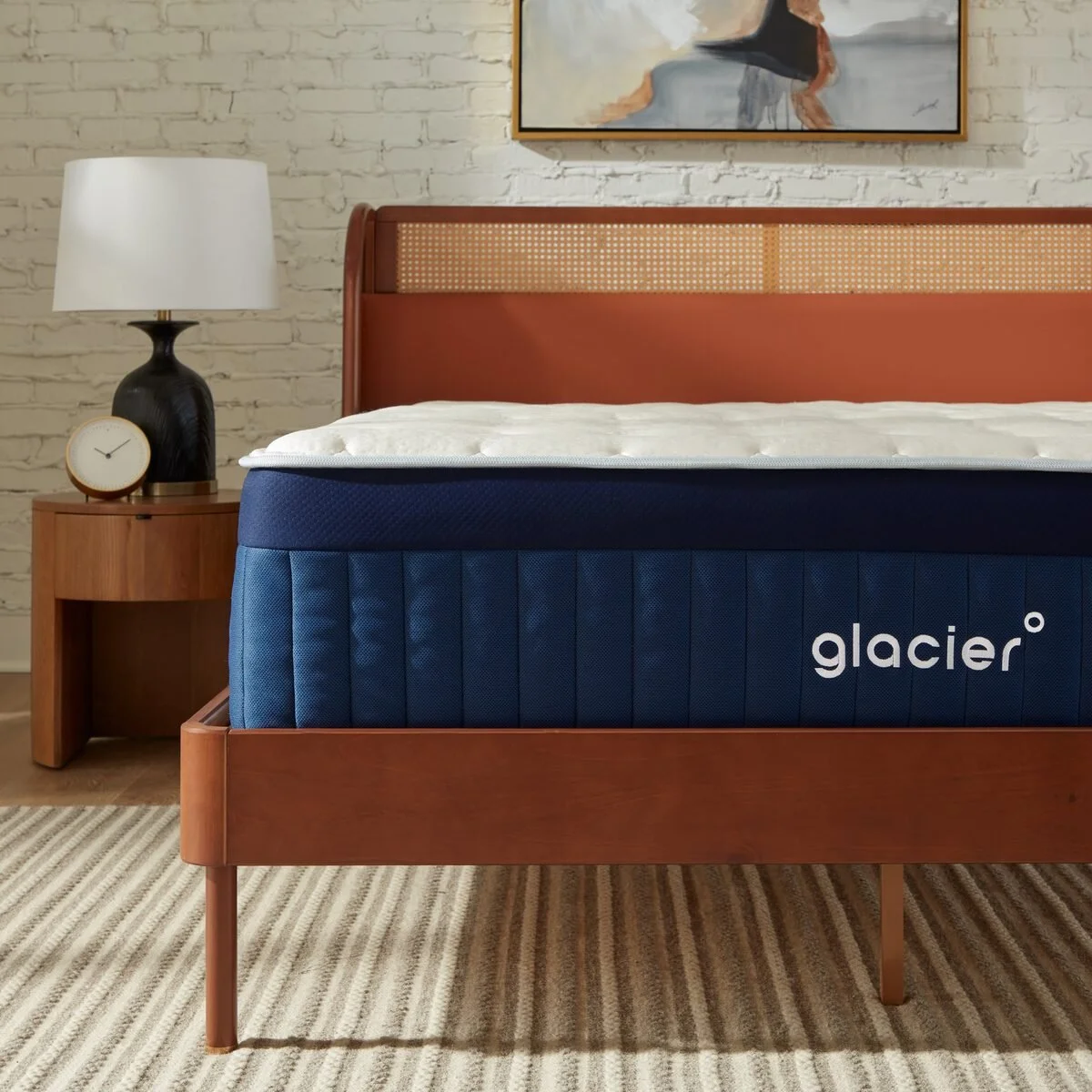 Glacier Summit Hybrid mattress with Euro top on a wooden bed frame