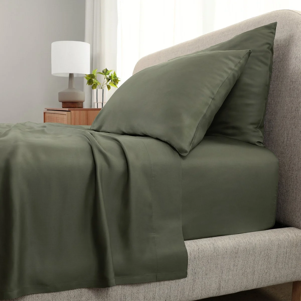 Cariloha Aloha Soft Sheets in Coastal Pine on a bed