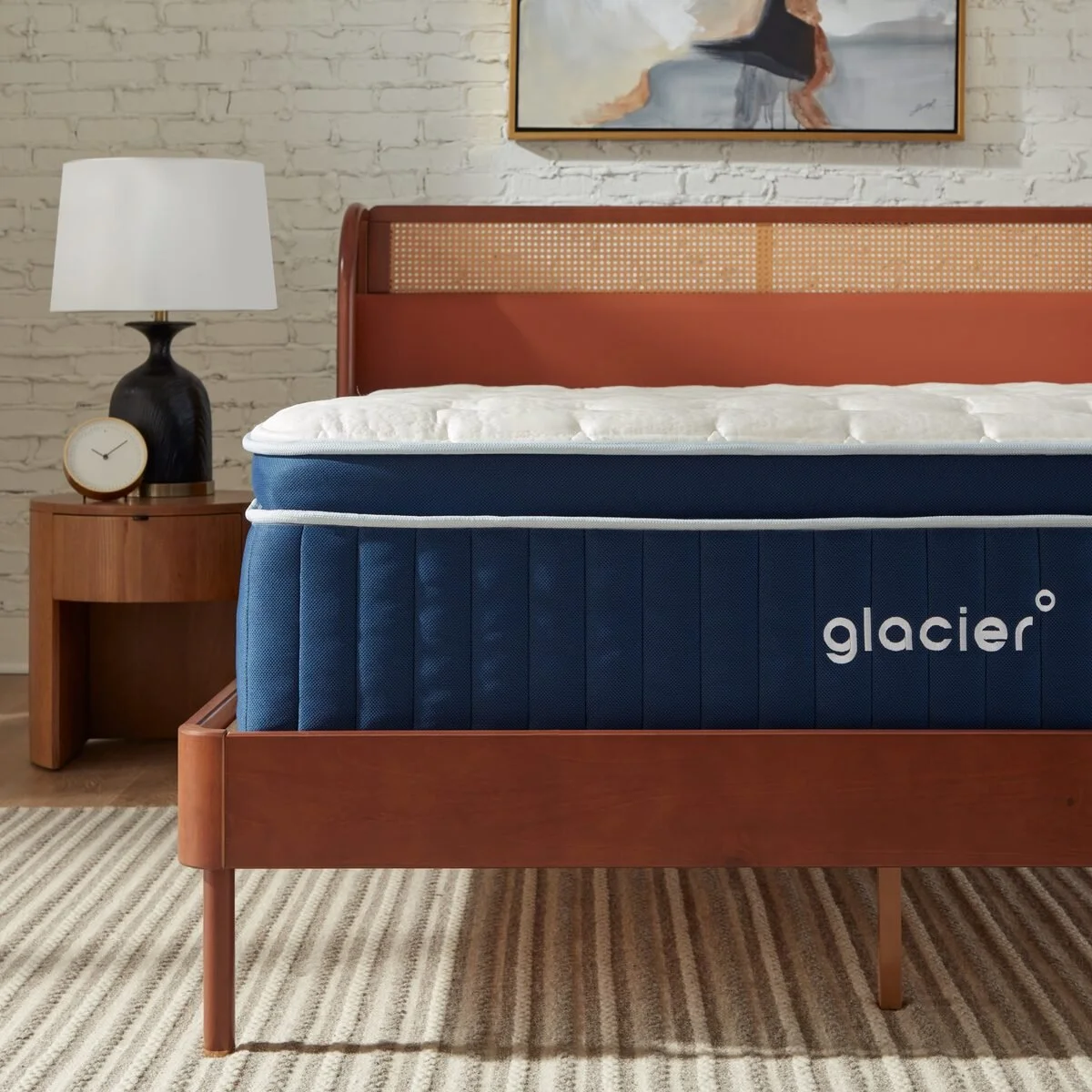 Glacier Apex Hybrid Euro pillowtop mattress on a wooden bed frame
