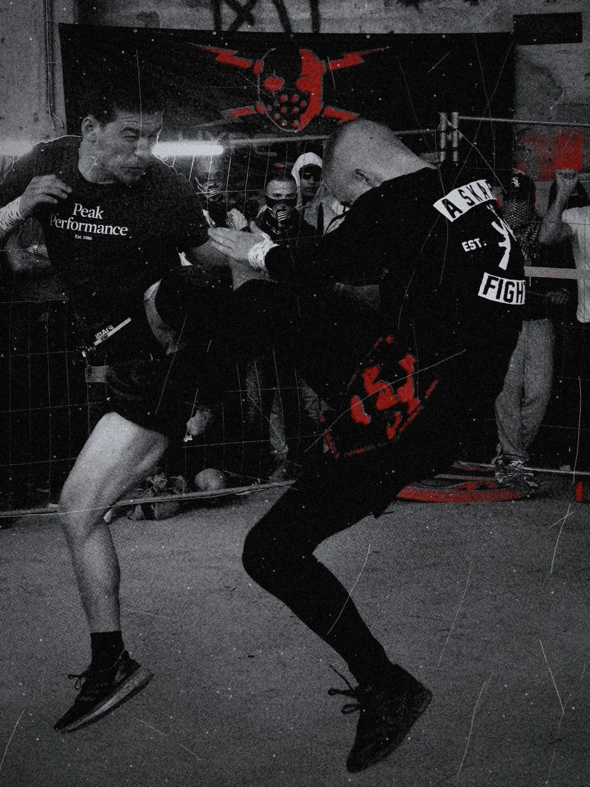 A fighter throwing a flying knee on concrete