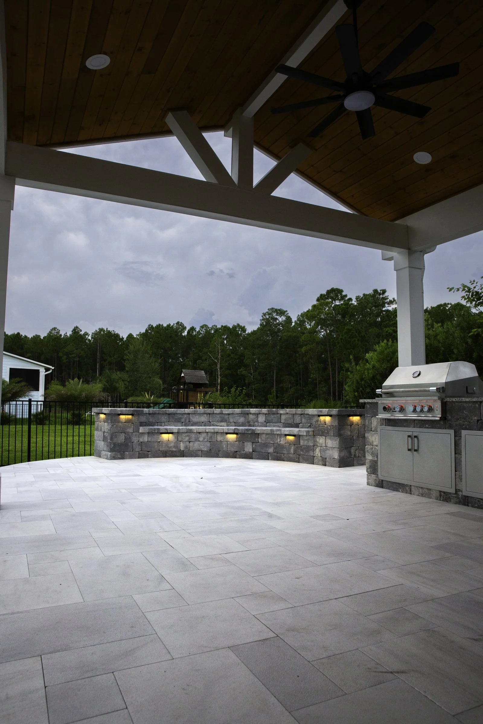 Outdoor kitchen under a cedar gable extension in Seabrook, Nocatee