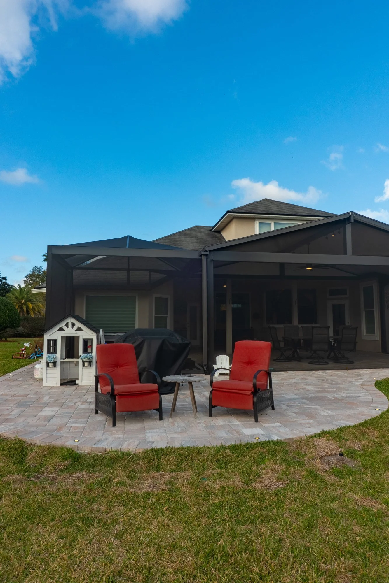 Screen room and curved paver patio extension in Julington Creek Plantation