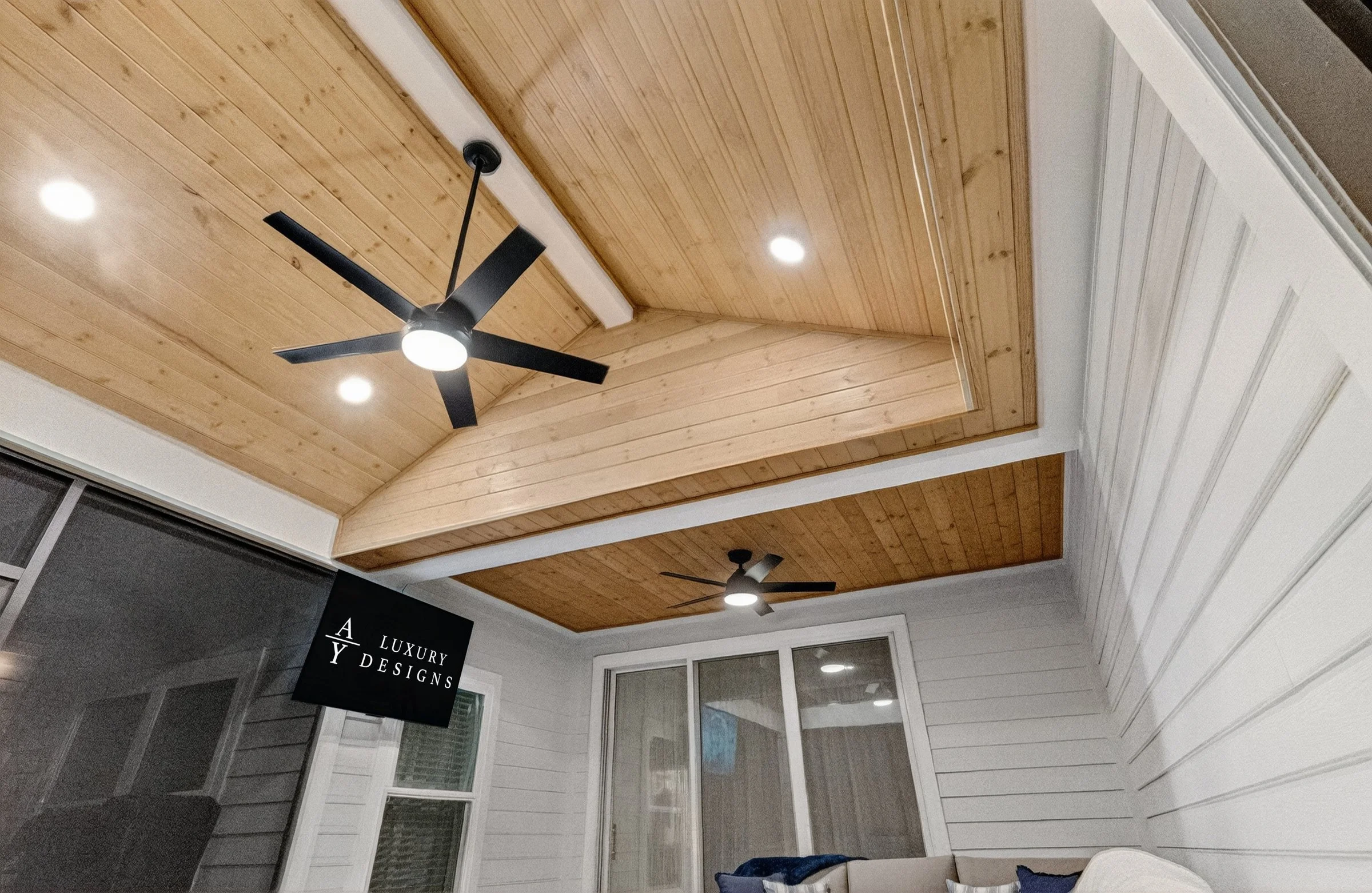 Lanai extension with ceiling fans inside a screen enclosure in Shearwater, St. Augustine