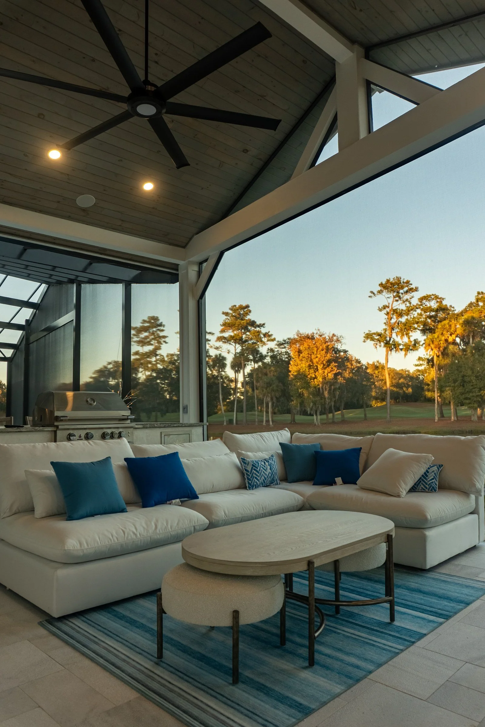 Cedar gazebo lounge inside a screen enclosure in The Coves (Sawgrass Players Club)