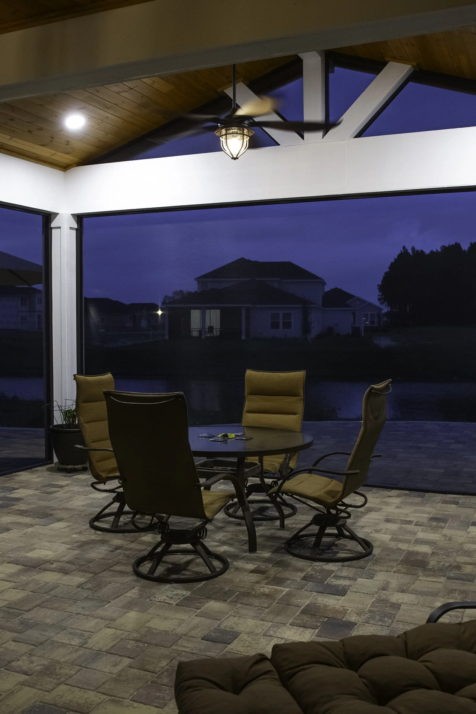 Covered lanai and paver patio dining area in SilverLeaf, St. Augustine