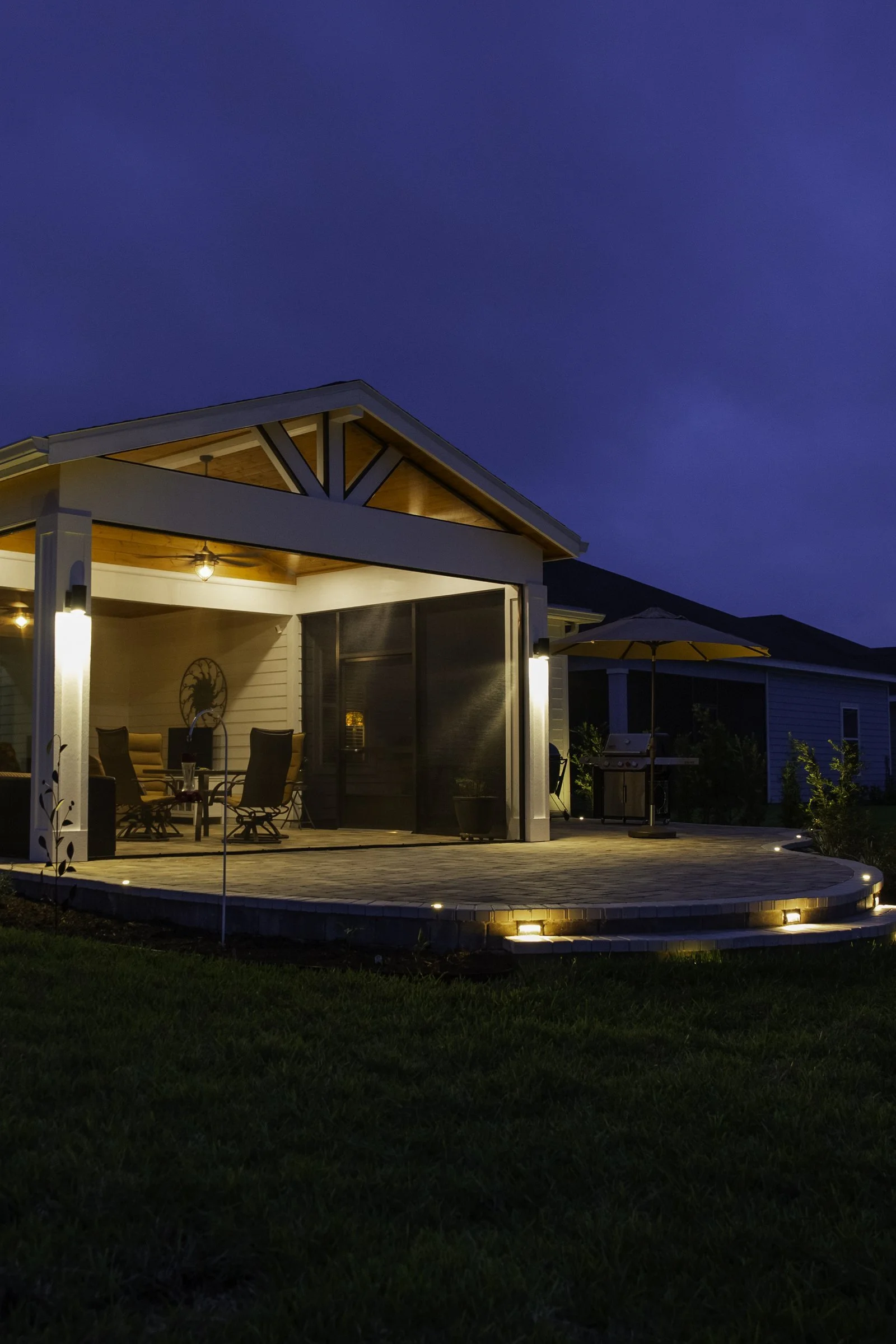 Cedar gazebo lanai extension at dusk in SilverLeaf, St. Augustine
