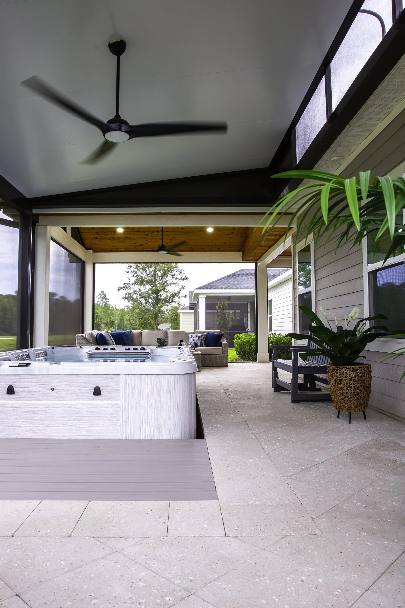 Screen room ceiling fan over a hot tub in Stillwater, St. Johns