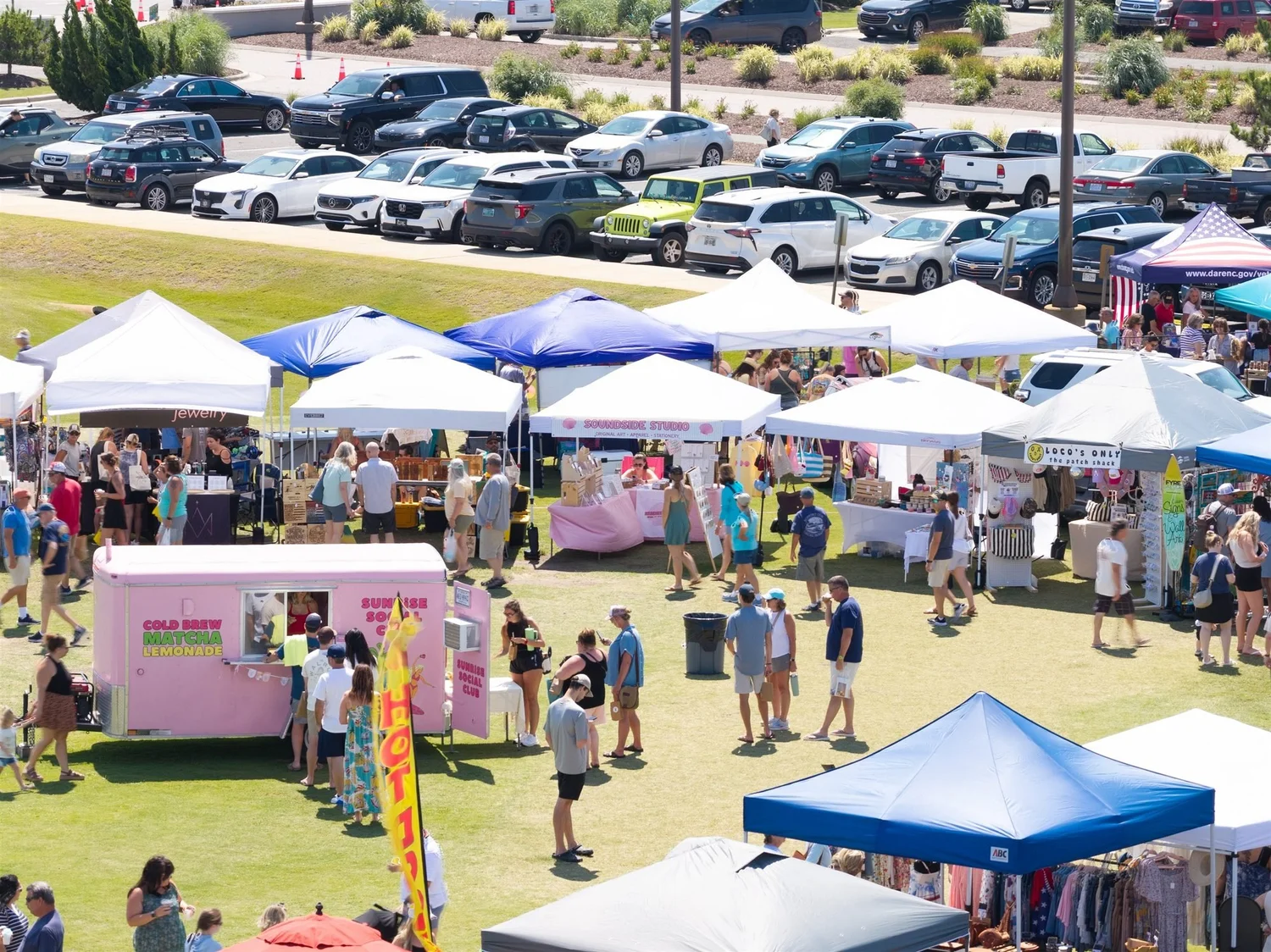 Shoppers along the vendor row, seen from above