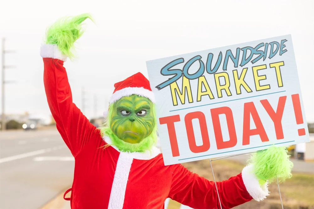 The Grinch flagging down traffic: Soundside Market today!
