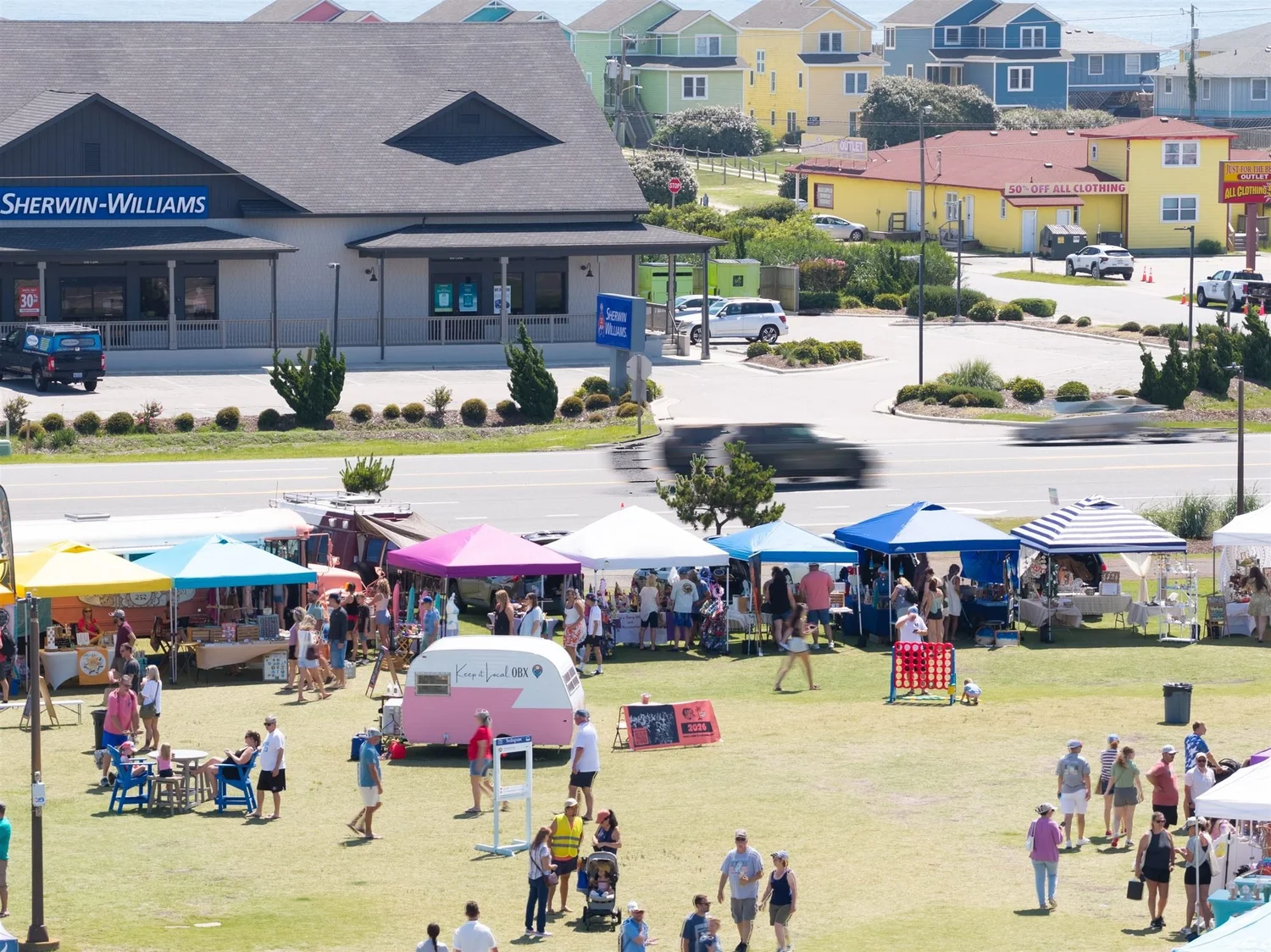 Tents and shoppers along the Nags Head waterfront