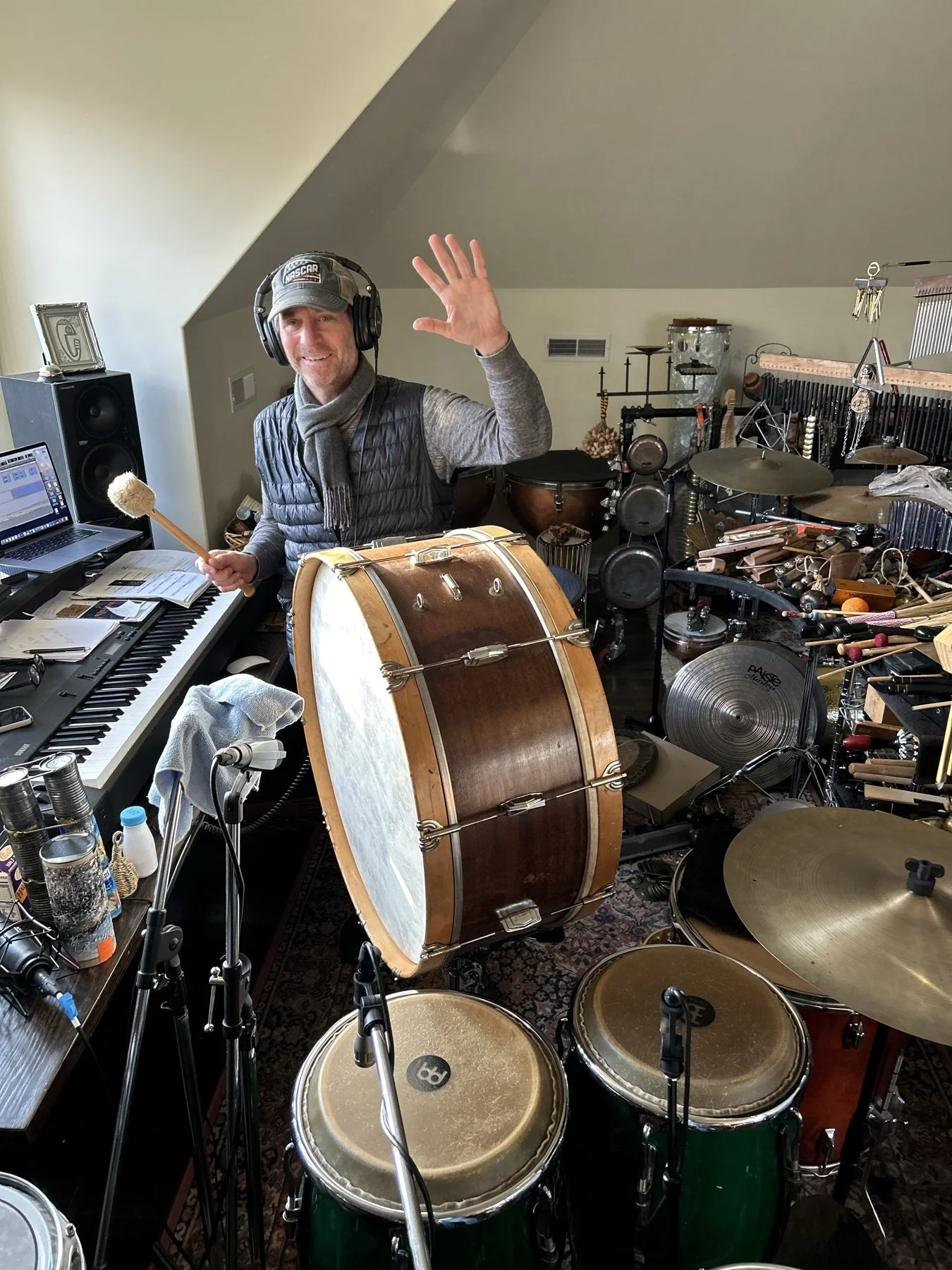 Percussionist Eric Darken surrounded by instruments in his studio