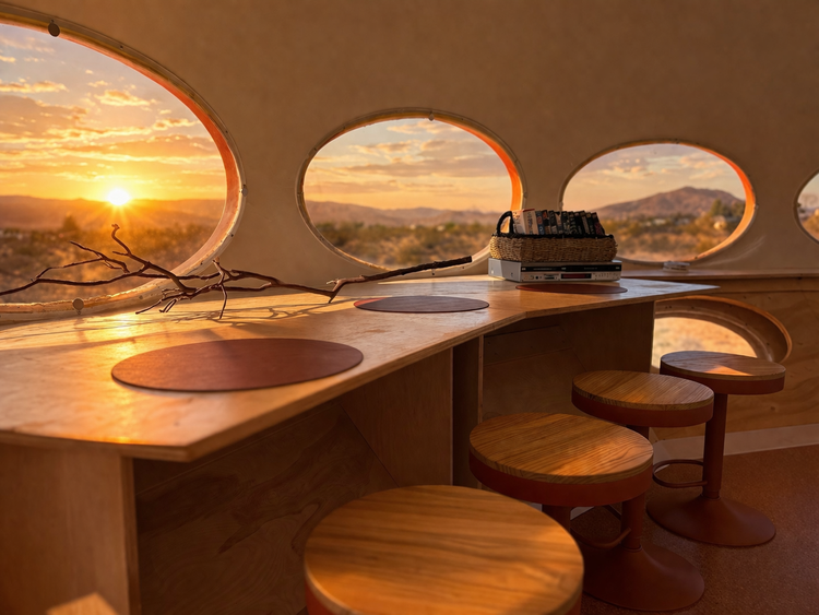 Desert sunset through the Futuro's oval windows