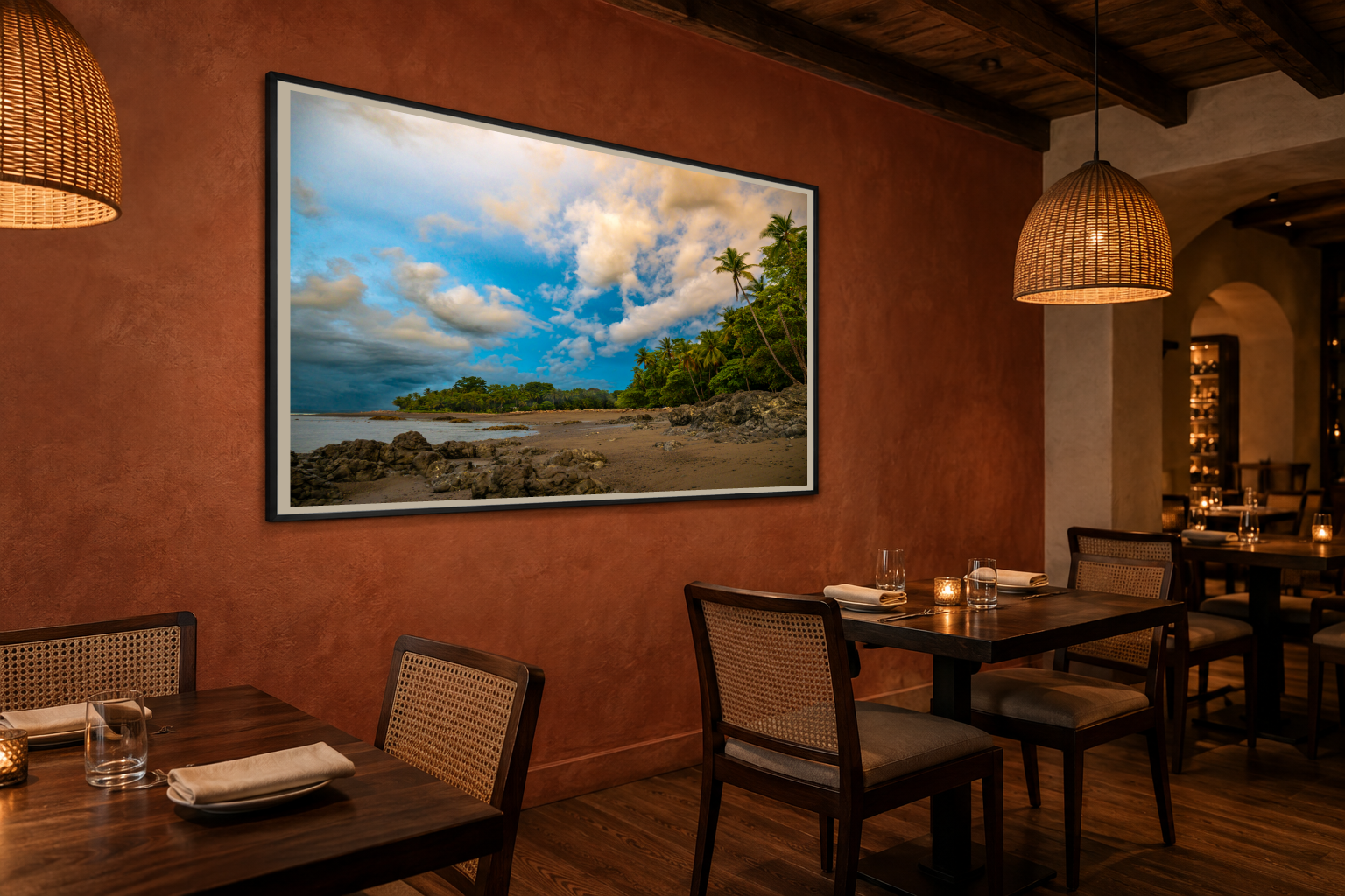 Tropical coastal photography displayed in a boutique restaurant