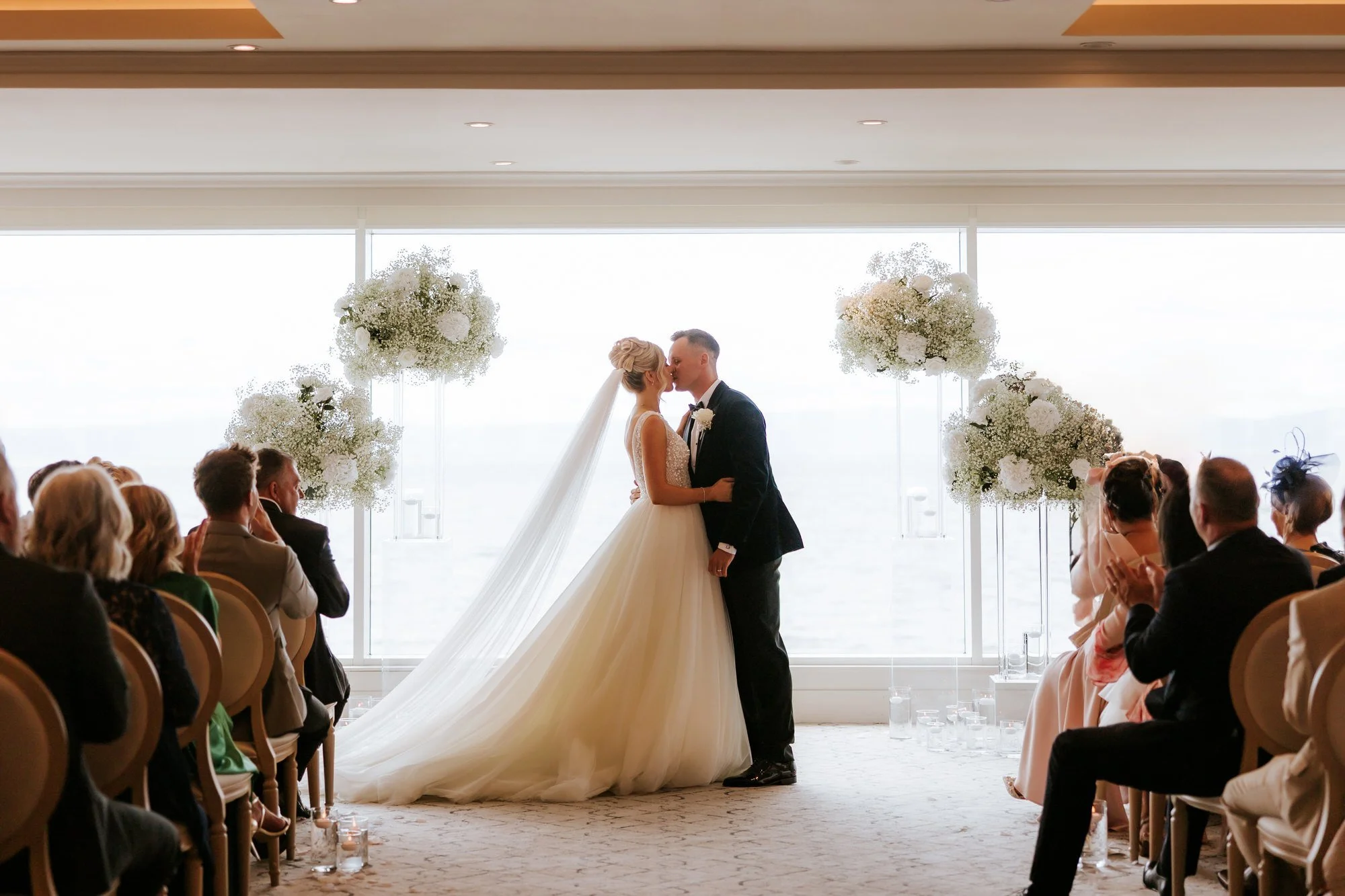 Nicole and Lawrence sharing their first kiss at the ceremony.