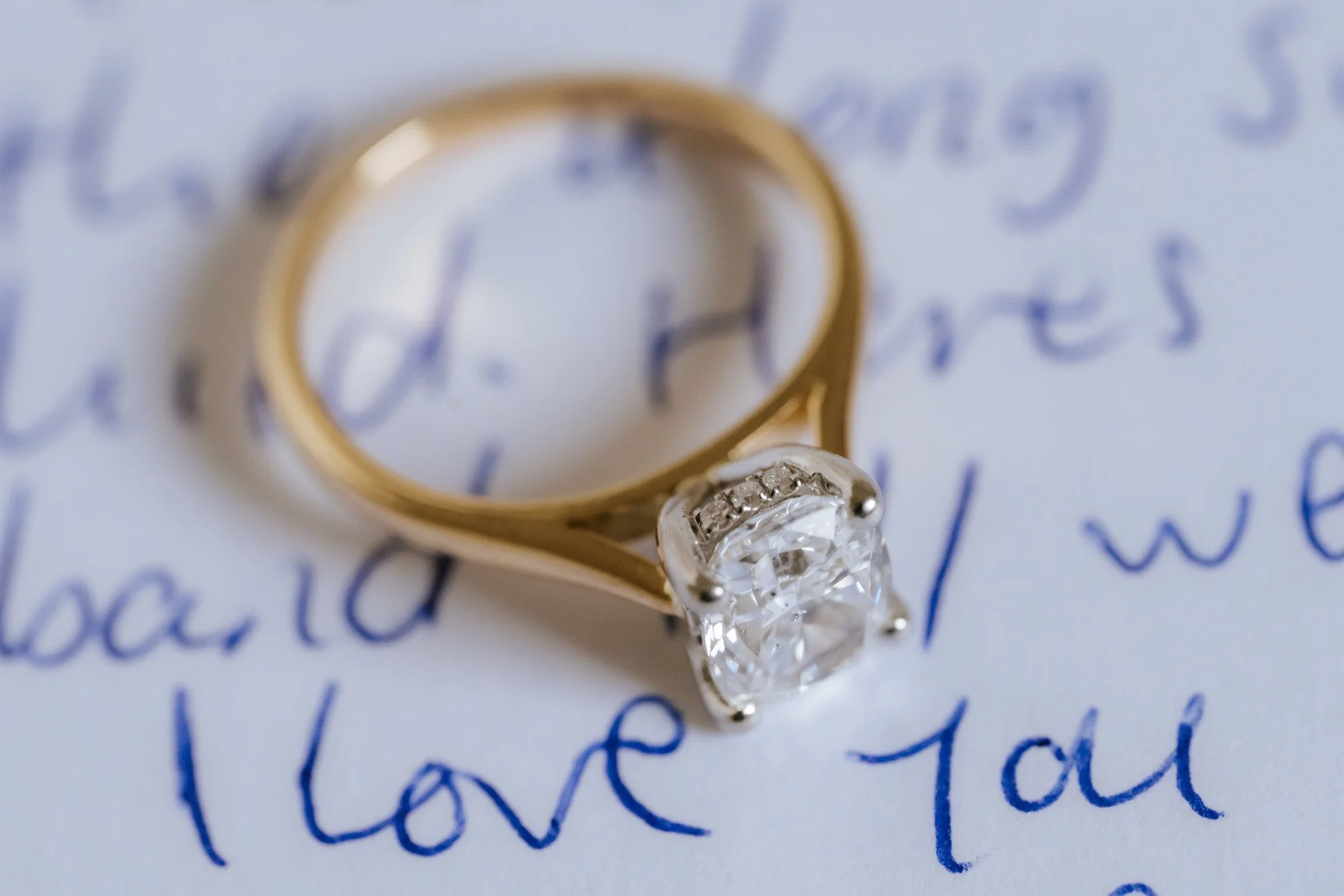 Rhona's engagement ring resting on a wedding morning card.
