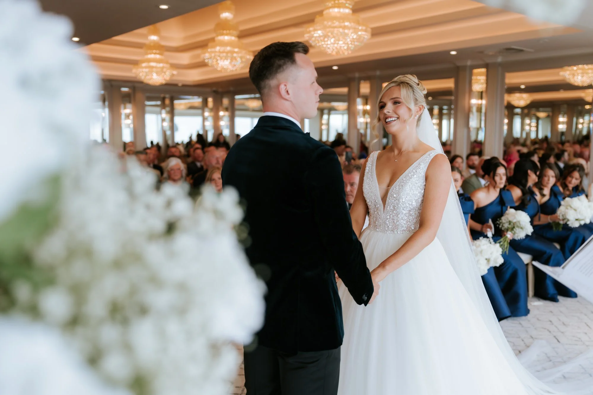 Nicole and Lawrence exchanging vows at Seamill Hydro.