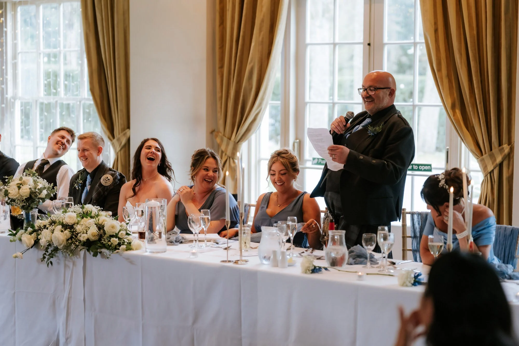 A wide view of the father of the bride's speech.