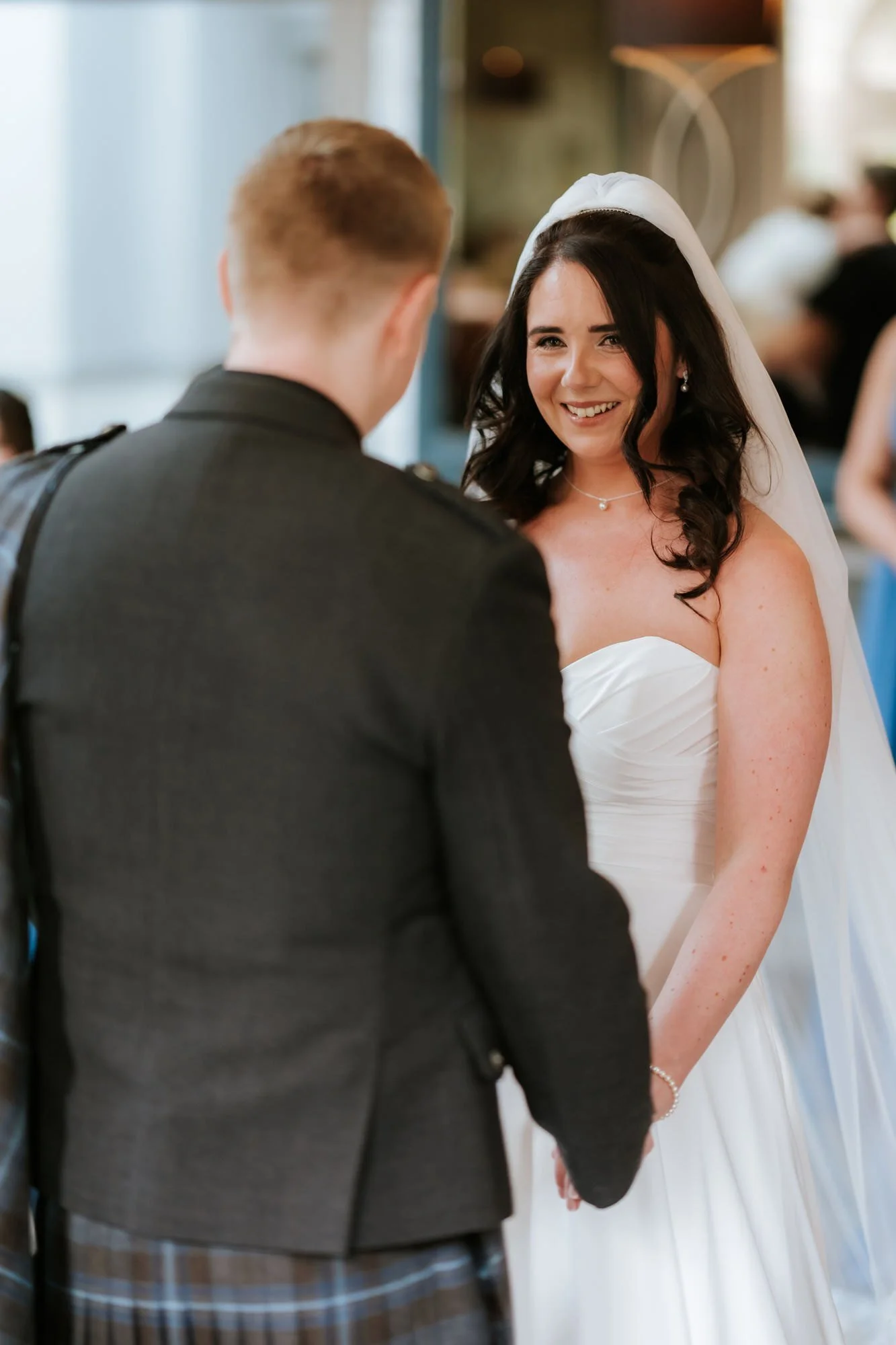 Steph smiling as she makes her wedding vows.