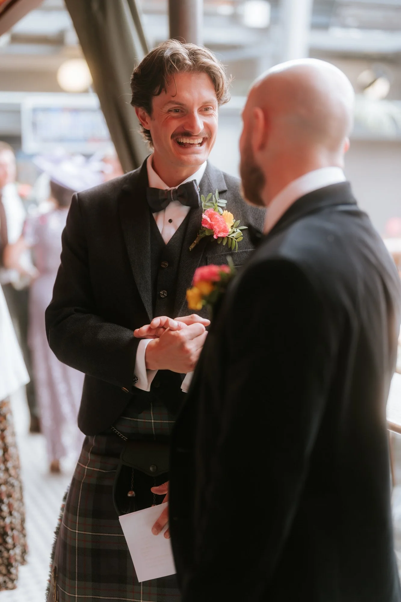 Ciaran sharing a handshake with a friend.