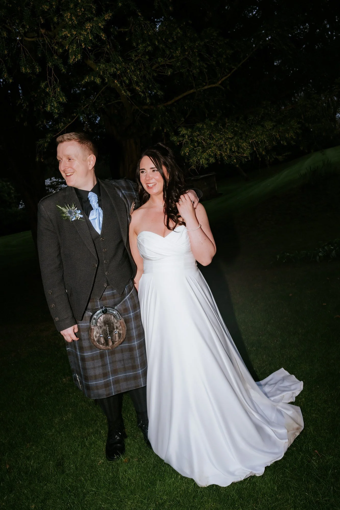 An evening portrait of the couple in the gardens.