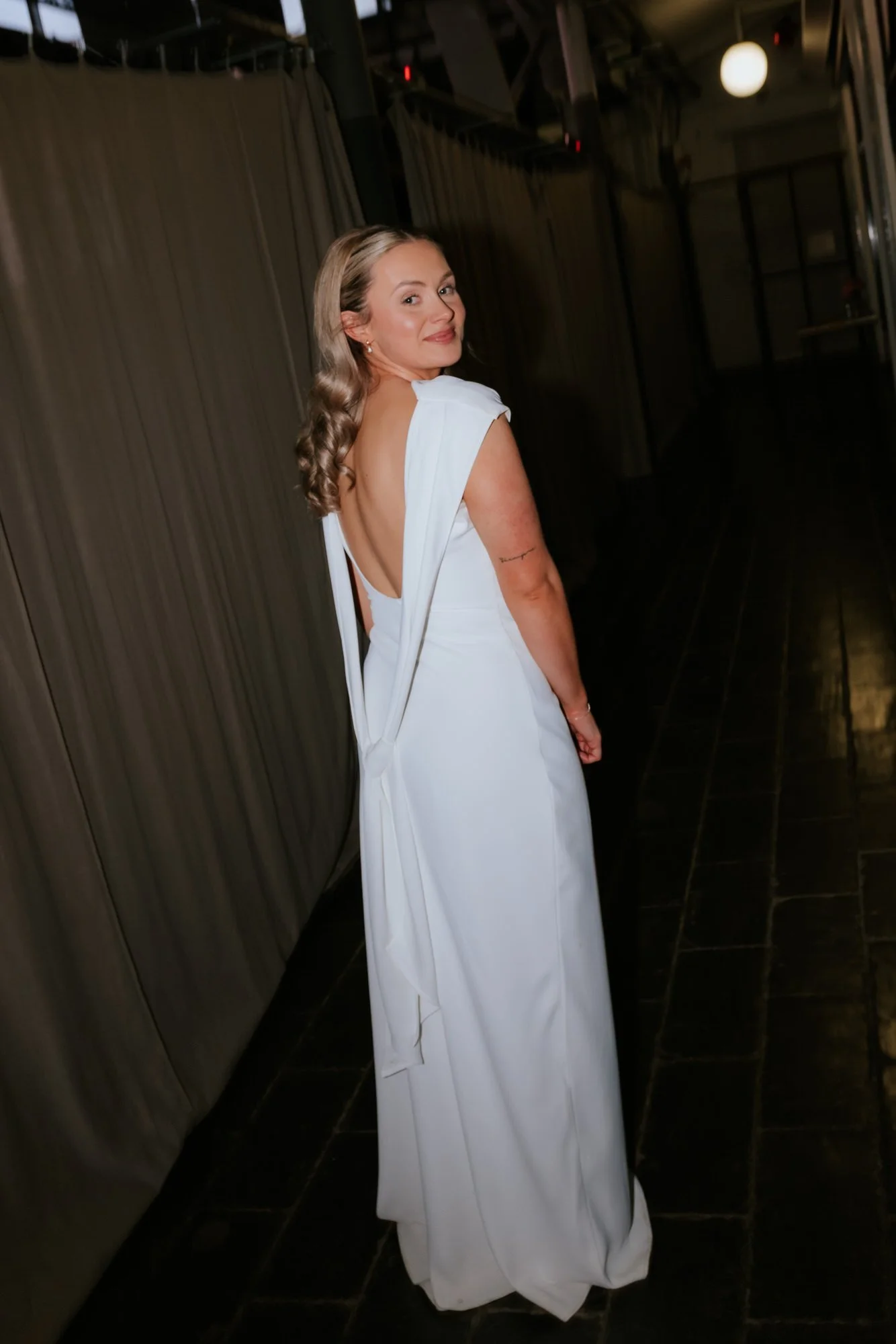 The draped back of Rhona's wedding dress.