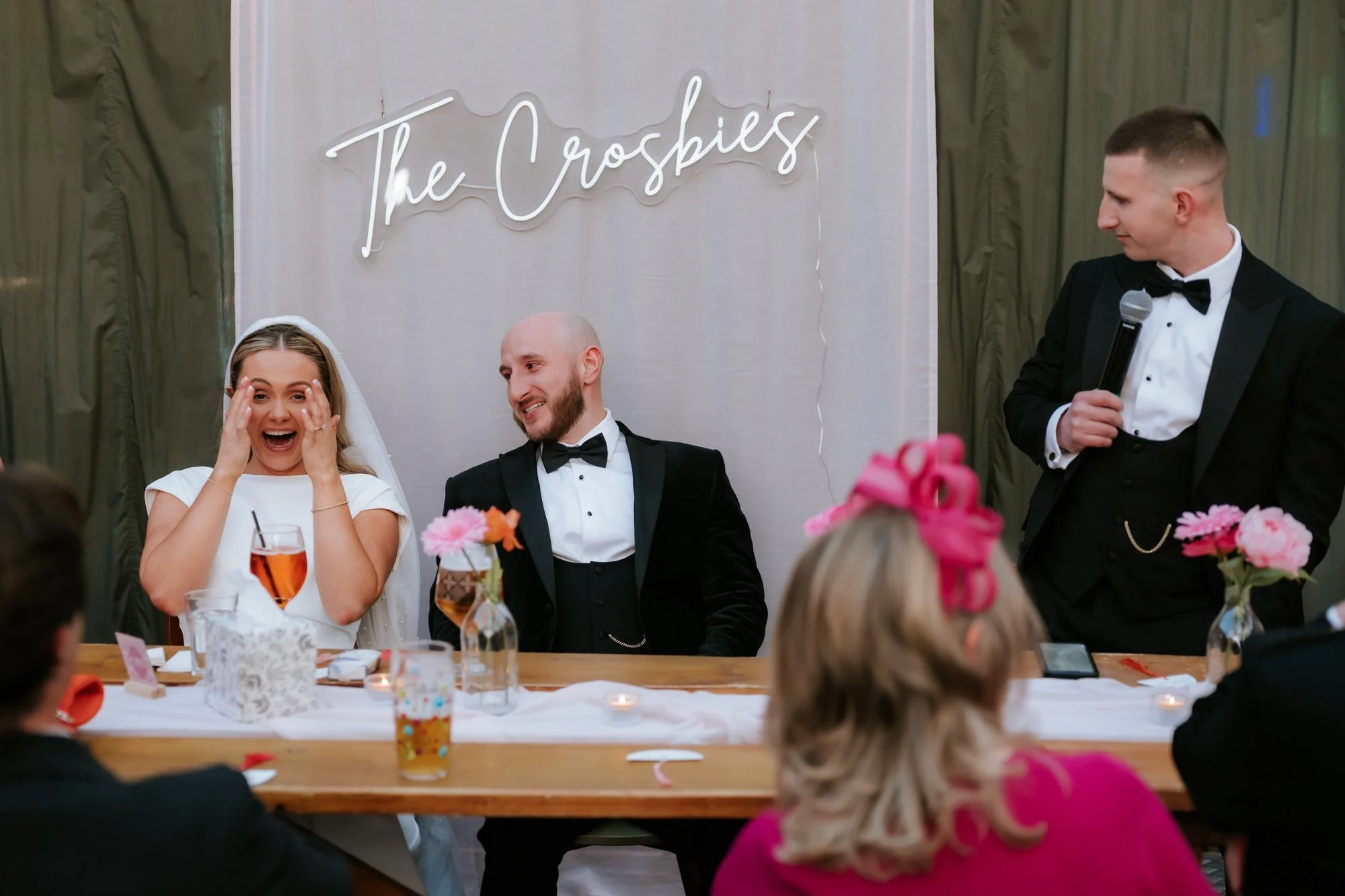 Rhona and Ciaran laughing together during the speeches.