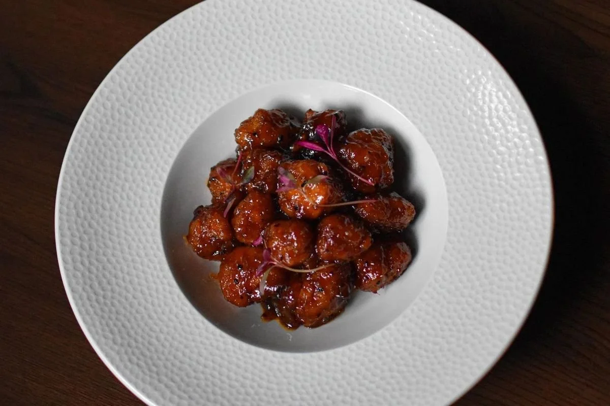 Mango Maple Chicken in a white bowl