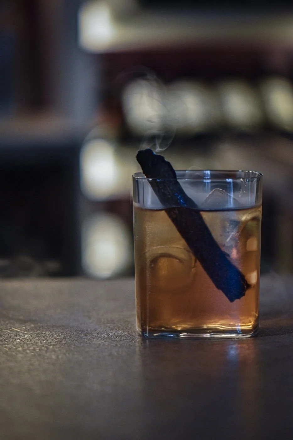 A smoked cocktail in a rocks glass