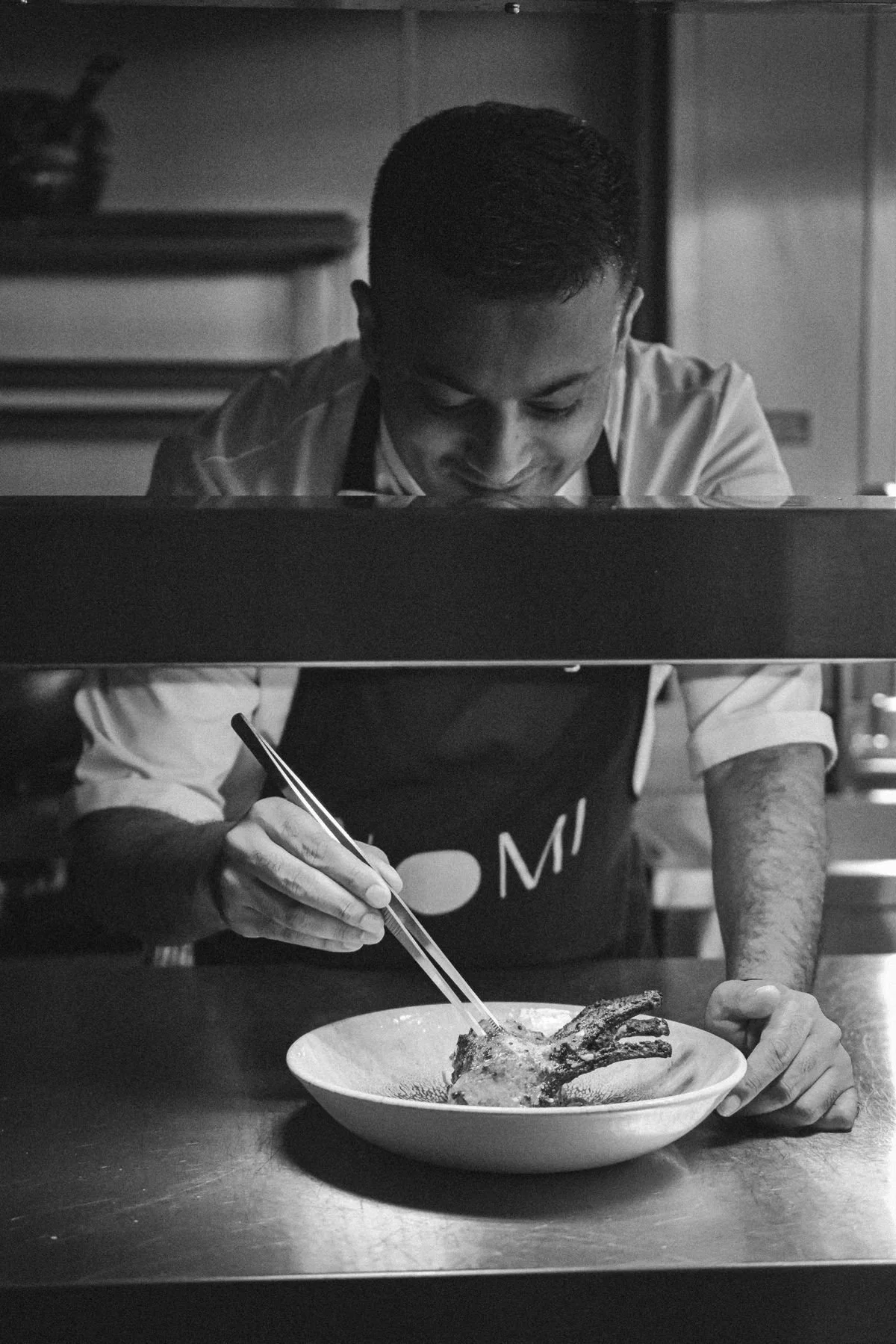 Kartik plating at the pass, in black and white