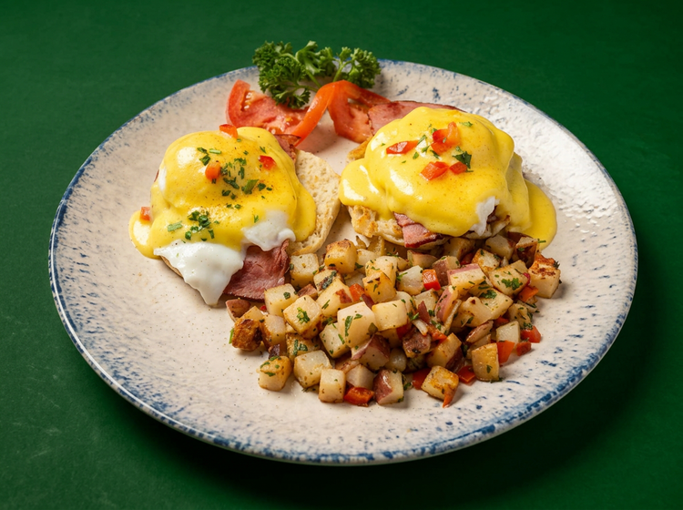 Eggs Benedict with hollandaise and country potatoes
